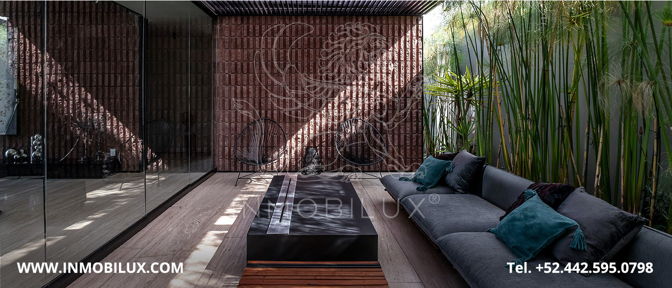 Sala y Terraza Casa Minimalista en el Campanario Querétaro